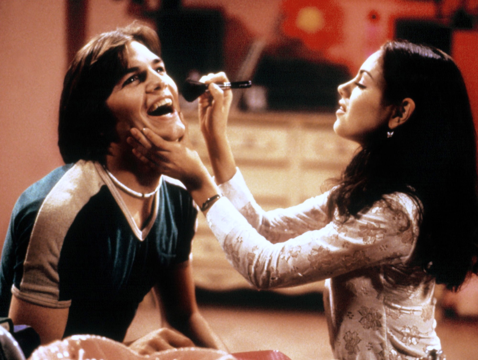 Ashton Kutcher e Mila Kunis como Michael Kelso e Jackie Burkhart